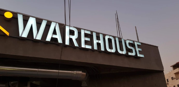Frontlit illuminated letters for Warehouse storefront sign