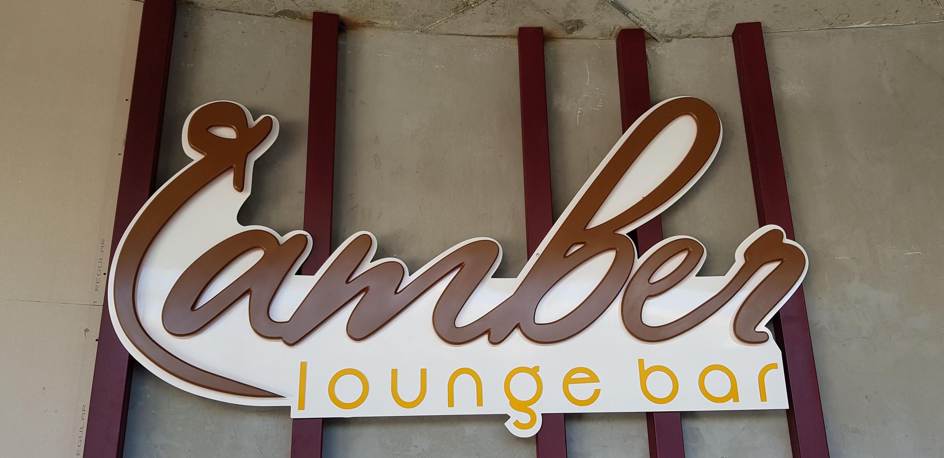 PVC Amber Lounge Bar lettering as facade decoration