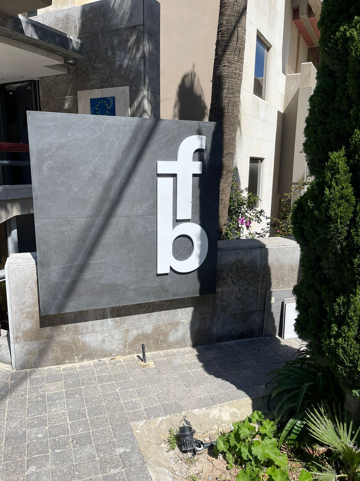 Die-cut PVC fb logo on outdoor monument sign