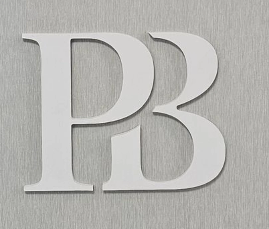 White 3D PVC PB monogram used as wall decor